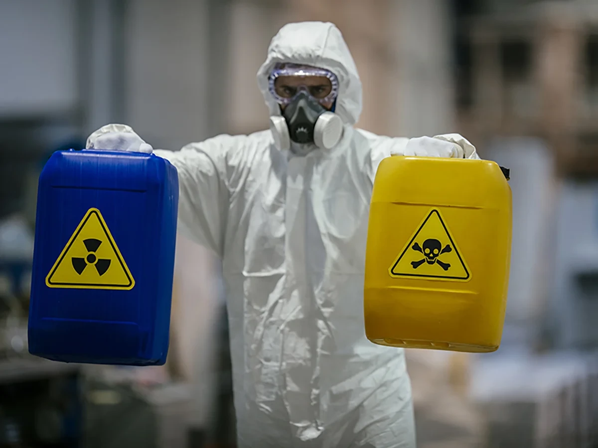 Biohazard cleanup technicians in protective equipment at a remediation scene in Lebanon, TN